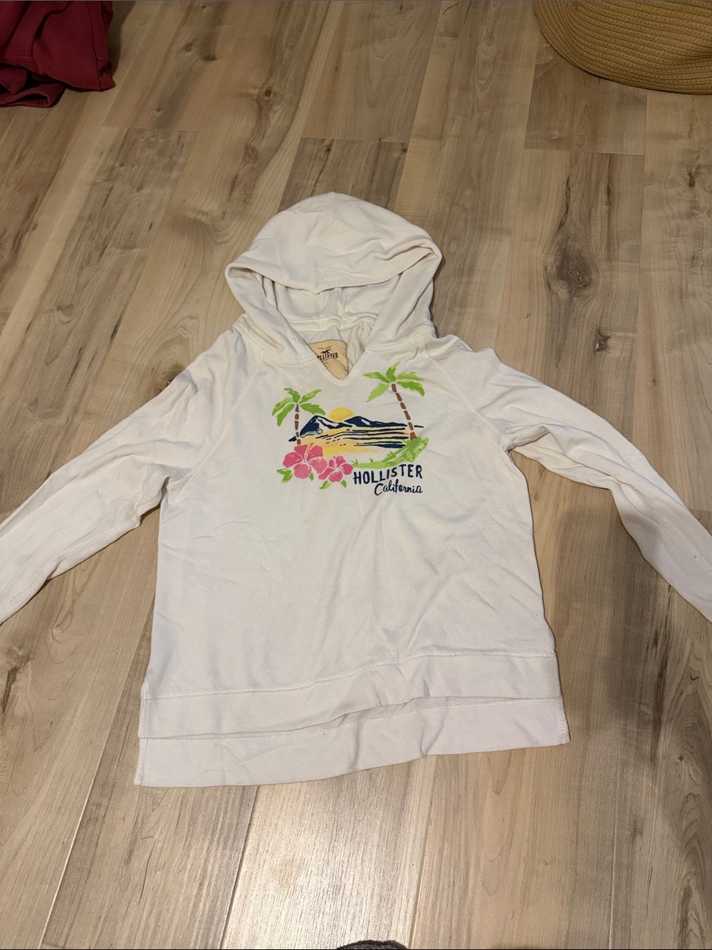 size medium hollister white hoodie with tropical graphic